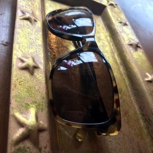 Woman’s DKNY sunglasses